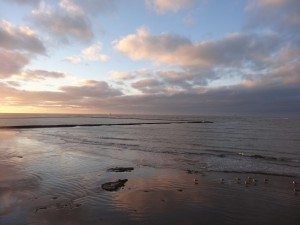 Soleil couchant sur la plage de Chipiona